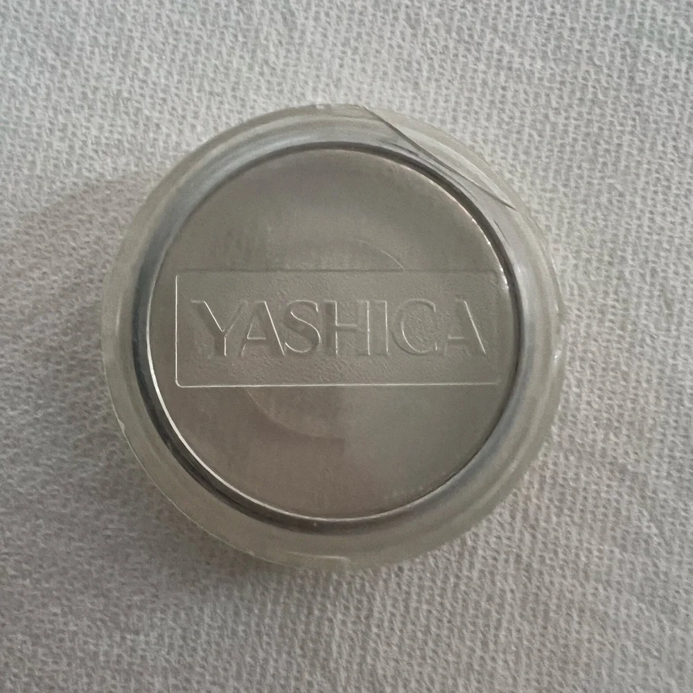 Yashica 55mm Skylight 1A filter.
